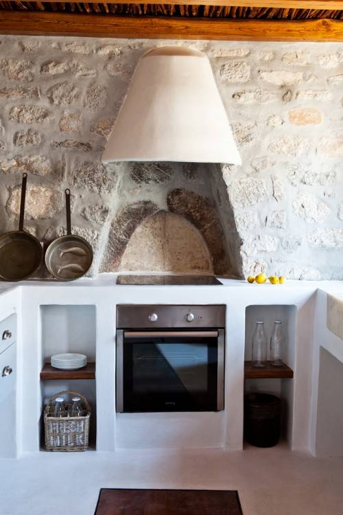 Typical Cycladic stone house in Mykonos by Deborah French Designs