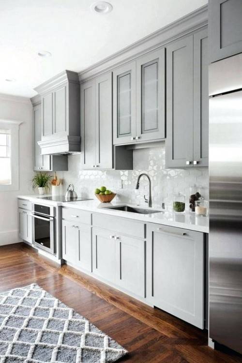 Dark gray kitchen cabinets by Kemper Cabinetry