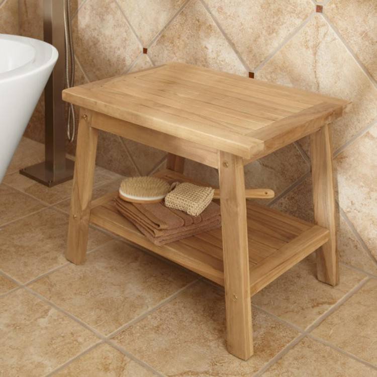 Teak wood shower floor surrounded by river rock, walls tiles in ceramic bar  wood tile