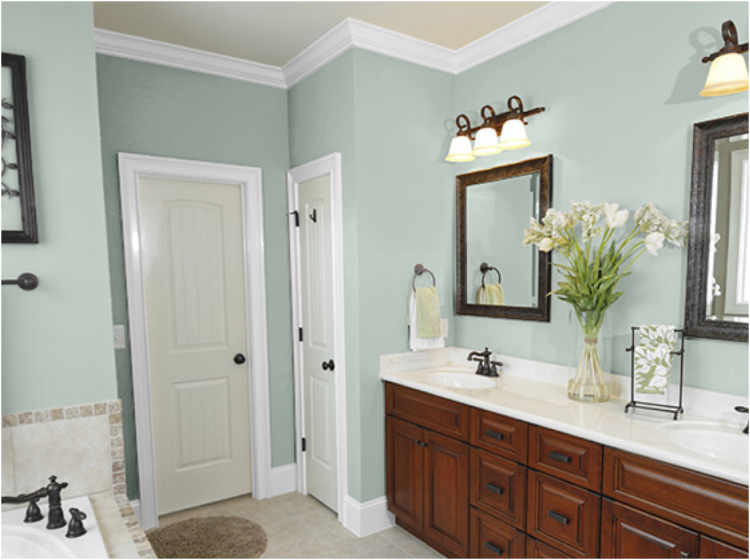 This beautiful Victorian bathroom design couples white metro tiles with a  bright blue feature wall