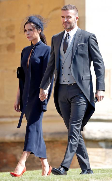 Despite failing to crack a smile during the big day, the fashion designer  loved the occasion and was full of praise for the gorgeous Givenchy gown  Meghan