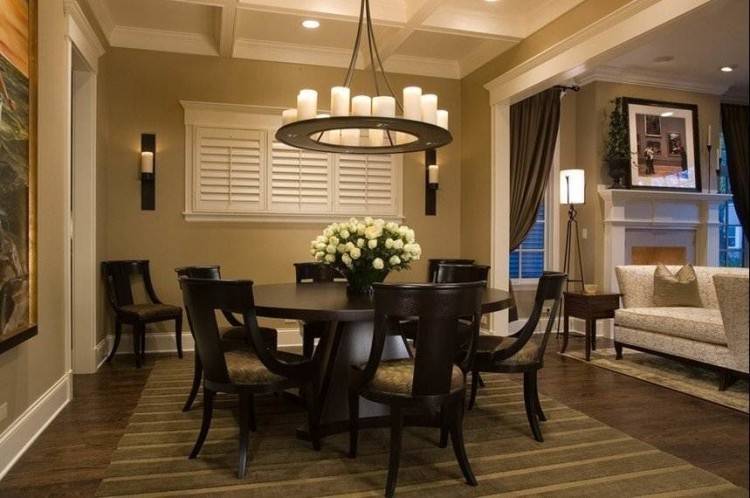 The soft glow of the chandelier over your dining room table