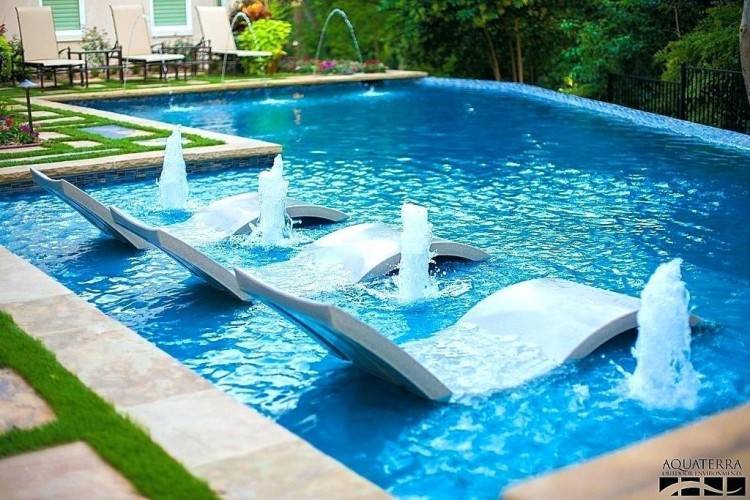 free form outdoor swimming pool design with blue lounge chairs plans  software