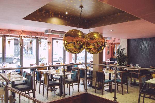 9m garlands decorated the wooden bookcases in the private dining rooms  whilst covered with the same eclectic mix of decorations