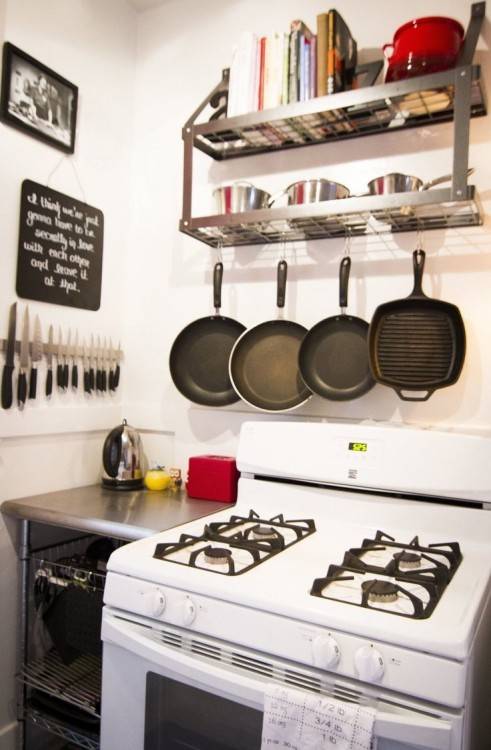 Create counter space in a small kitchen by adding a storage shelf