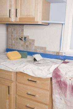 Backsplash tile tips: If the tile will go around any windows, remove the  apron molding from below the stool