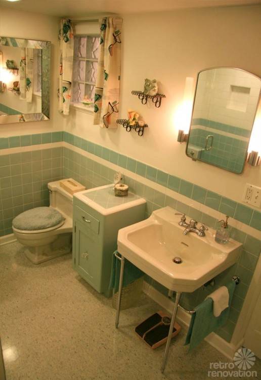 blue and gray bathroom view in gallery light