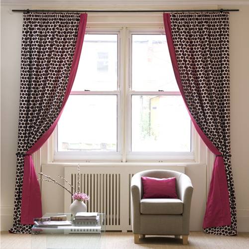 Flat shaped pelmets over draperies in this bay window treatment form a cozy  sitting area within the Master Bedroom