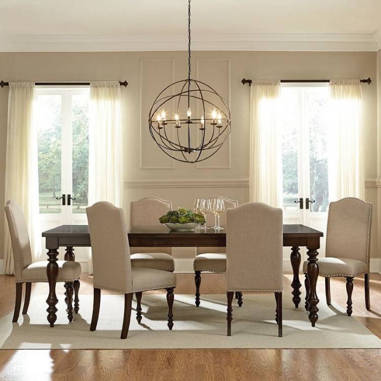 A handy rule of thumb is that a chandelier should be 12 inches narrower  than a table and have at least 48 inches of space from each of the room  walls or