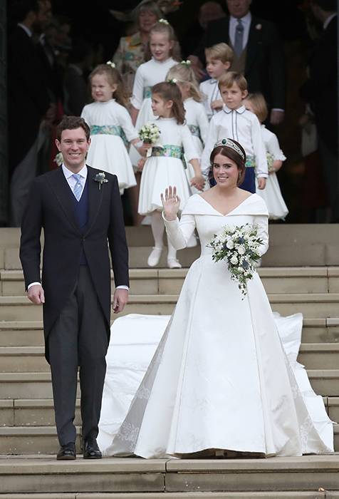 Spain's Princess Cristina and her new husband Inaki Urdangarin stroll along the gardens of Barcelona's Pedralbes Palace following their wedding at